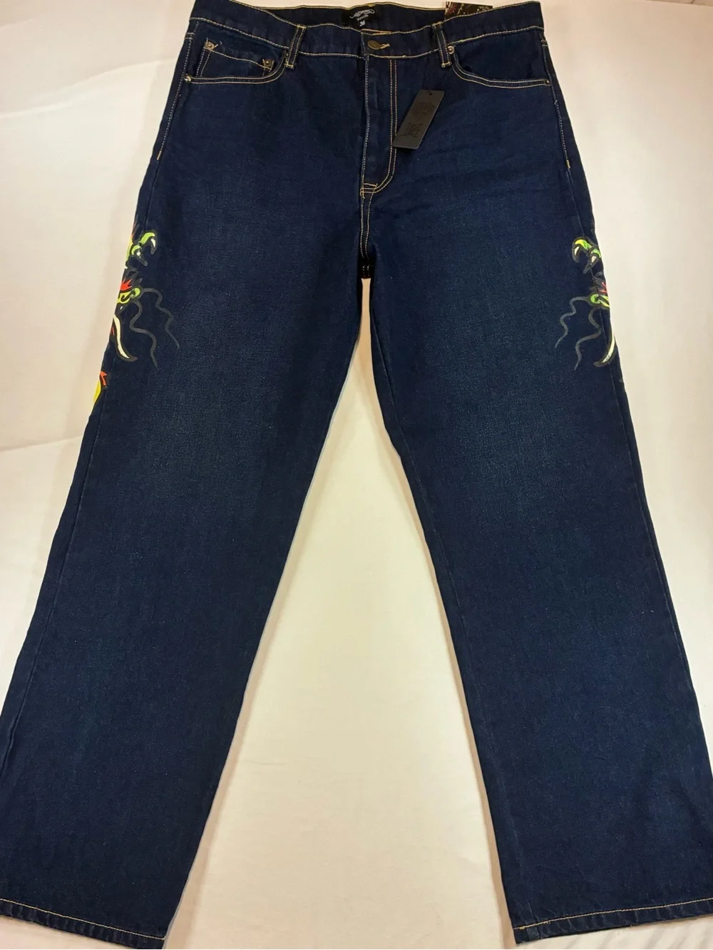 Ed Hardy Dark Blue Jeans with Yellow Script and Neon Skull Artwork